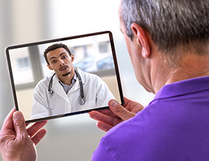 patient on zoom with a doctor
